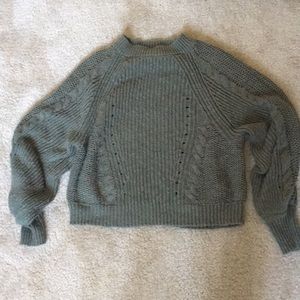 Cropped green sweater